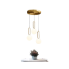 chandelier and a table with flower vase on top